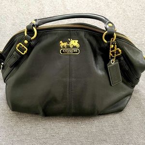 Authentic Coach purse, has regular sign of wear , no rips, from smoke free home.